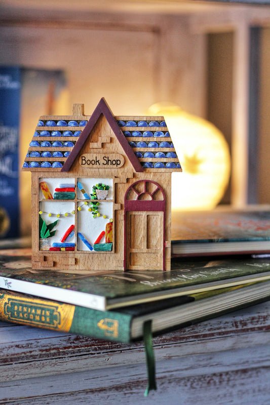 Book Shop - libreria in mosaico con tetto blu