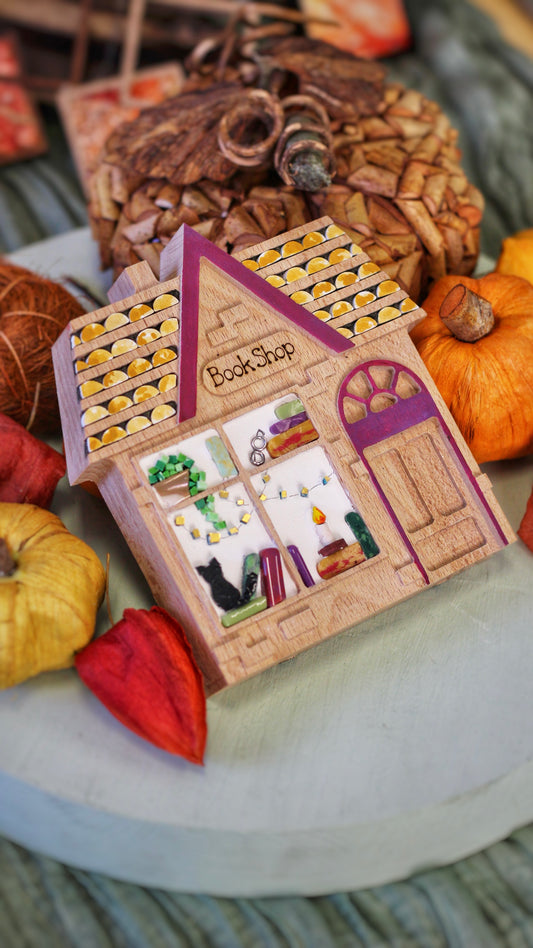 Book Shop - libreria in mosaico con gatto